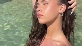 Leah Halton nude showing off her big boobs on the beach!!!